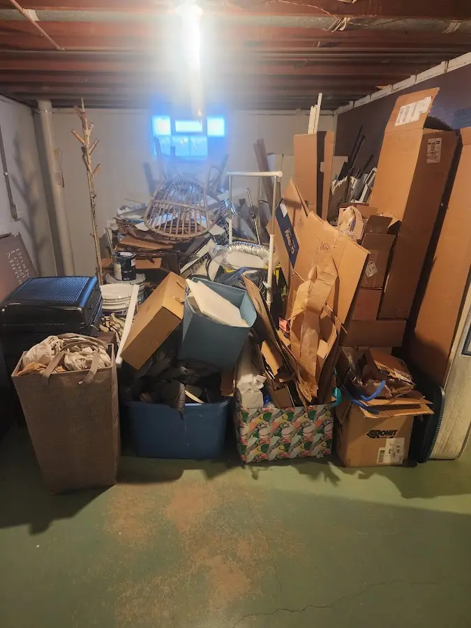 Roll-off dumpster container at job site for 6 Yard Dumpster Rental in Powell